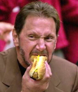 Larry eating a hot dog